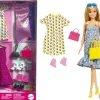 Barbie fashionista con 4 modas