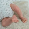 Bebé Reborn Isabella 40 cm. con Cojín Beige